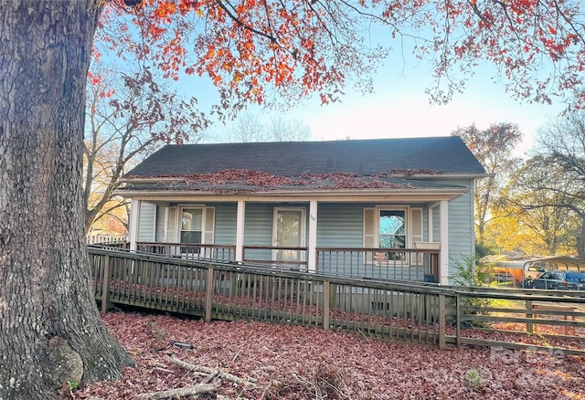 rear view of house with a porch