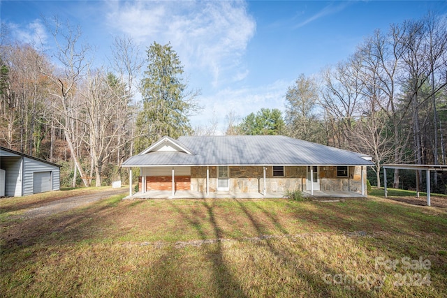 view of front facade with a front lawn and a porch