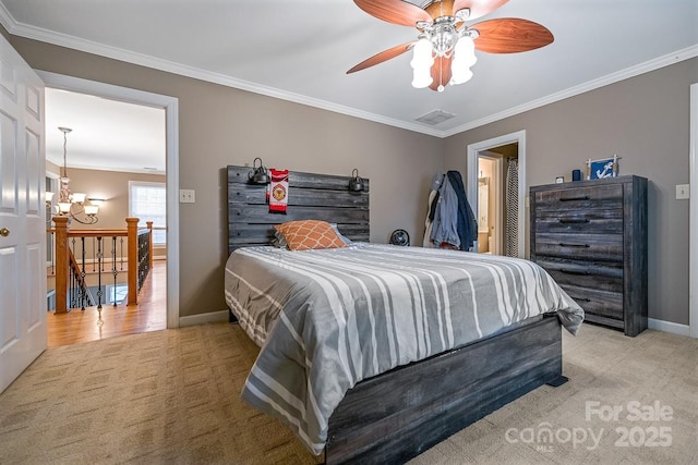 bedroom featuring visible vents, ornamental molding, and light colored carpet