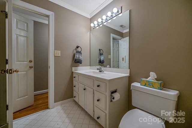 half bathroom featuring visible vents, toilet, ornamental molding, vanity, and tile patterned floors