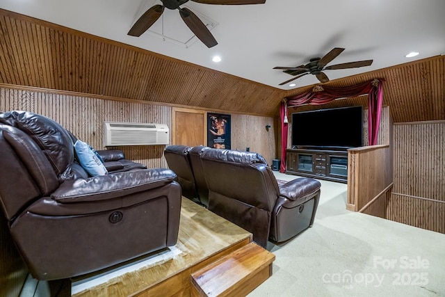 carpeted living area featuring a wall unit AC, wooden walls, a ceiling fan, and recessed lighting