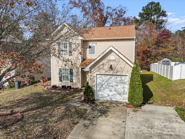 front facade featuring a front yard