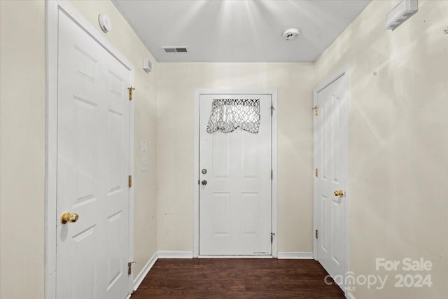 interior space with dark wood-type flooring