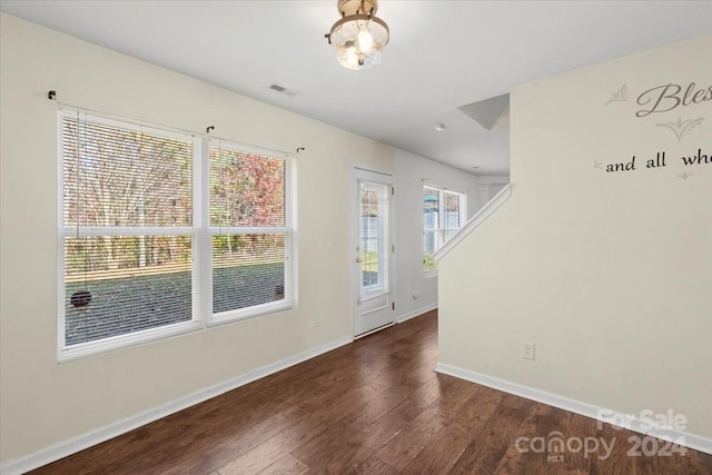 foyer entrance featuring dark hardwood / wood-style flooring