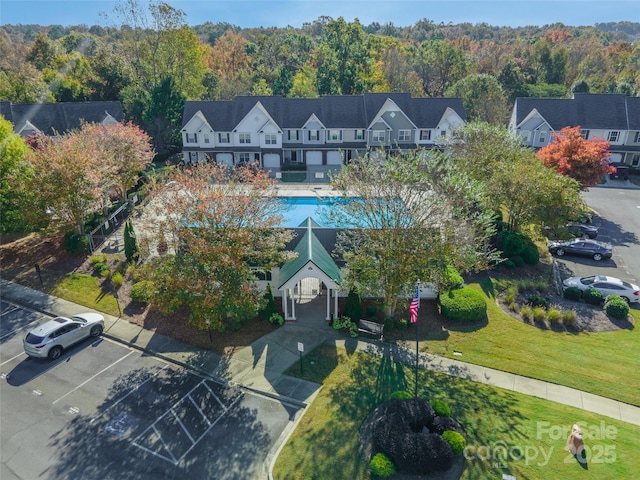 drone / aerial view with a view of trees