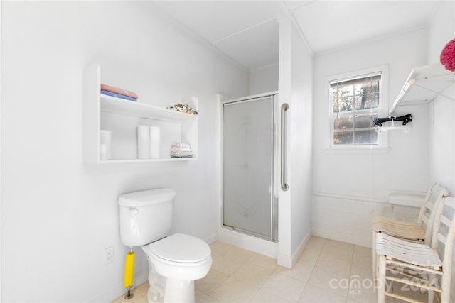 bathroom featuring toilet, tile patterned flooring, and walk in shower