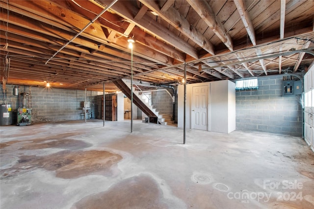 basement featuring water heater