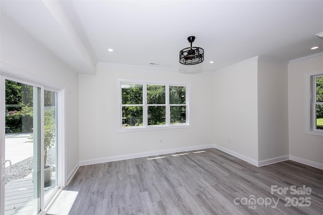 6534 Providence Rd, Charlotte, NC 28226 - empty room featuring baseboards, recessed lighting, crown molding, and wood finished floors