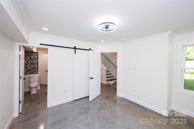 6534 Providence Rd, Charlotte, NC 28226 - unfurnished bedroom featuring a barn door, crown molding, baseboards, and concrete floors