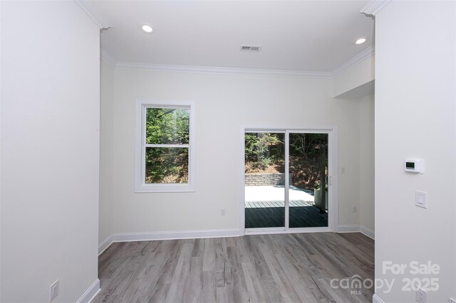6534 Providence Rd, Charlotte, NC 28226 - spare room with wood finished floors, baseboards, ornamental molding, and recessed lighting