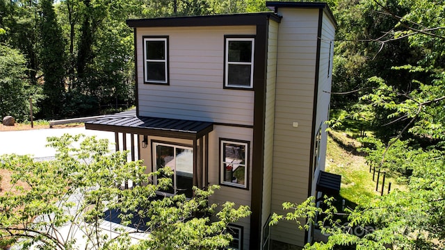 6534 Providence Rd, Charlotte, NC 28226 - view of front of house featuring metal roof and a standing seam roof