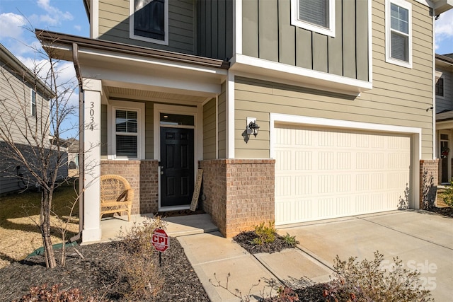 entrance to property featuring a garage