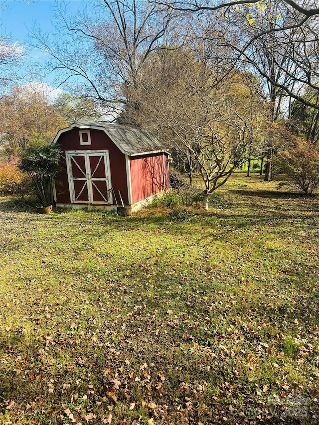 exterior space with a storage shed