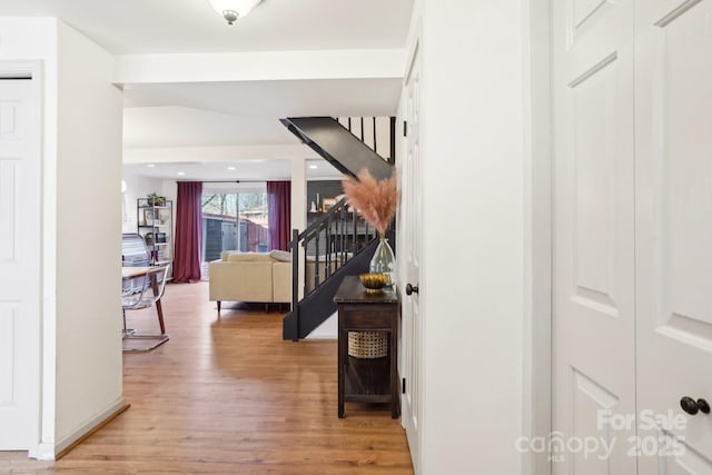 5300 Fair Wind Ln, Charlotte, NC 28212 - corridor featuring light wood-style floors and stairway