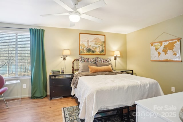 5300 Fair Wind Ln, Charlotte, NC 28212 - bedroom featuring baseboards, light wood-style floors, and ceiling fan