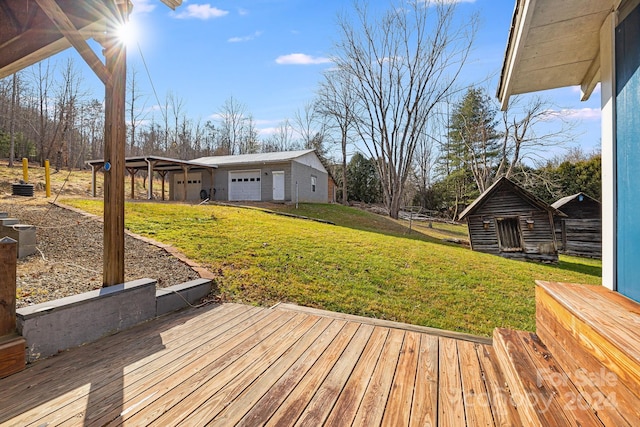 deck with a yard and an outdoor structure