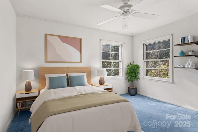 bedroom with carpet flooring, baseboards, and ceiling fan