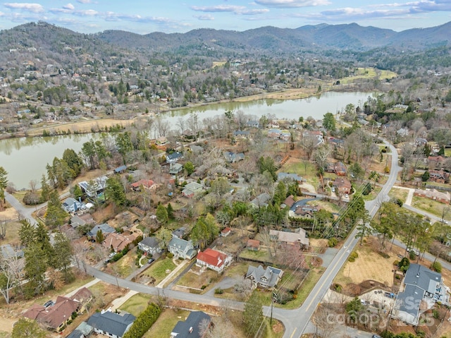 bird's eye view featuring a residential view and a water and mountain view