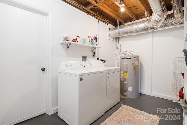 laundry room featuring washer and dryer and electric water heater