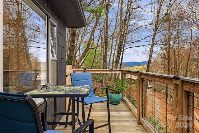 balcony featuring a deck with mountain view