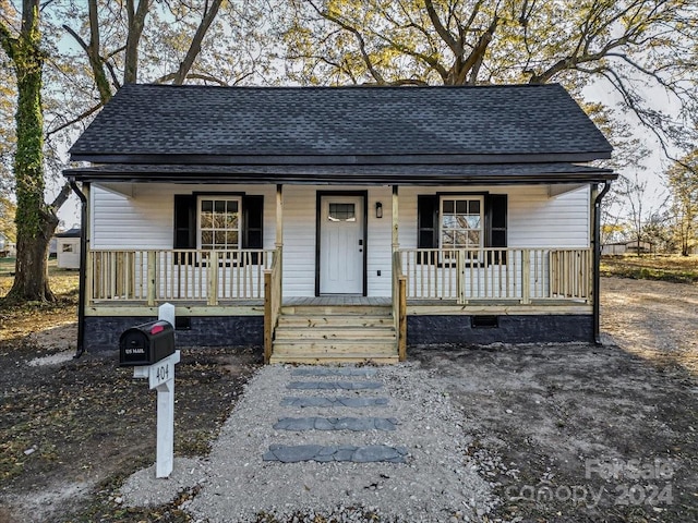 view of front of property featuring covered porch