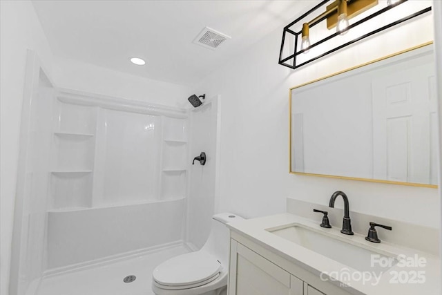 bathroom featuring visible vents, toilet, recessed lighting, a shower, and vanity