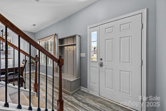 foyer with hardwood / wood-style flooring