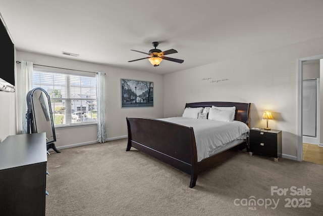 bedroom with ceiling fan and carpet flooring