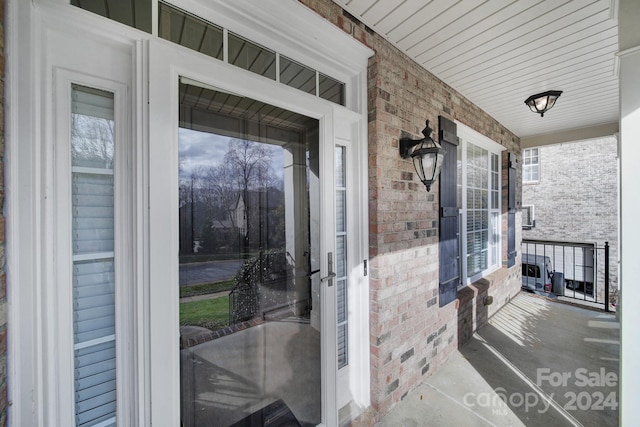 property entrance with a porch