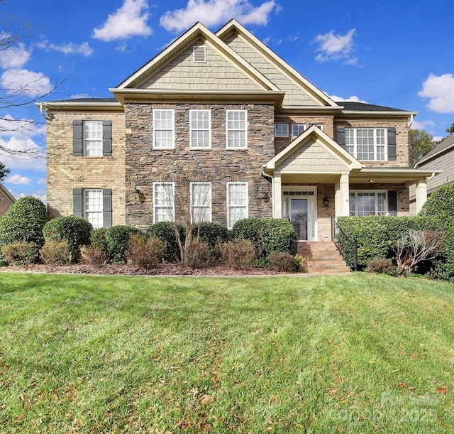 view of front of home with a front yard