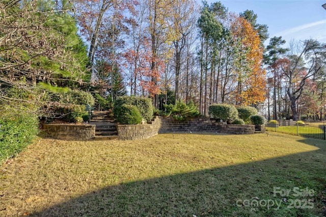 view of yard with fence