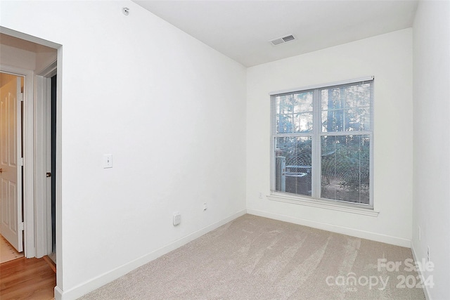 view of carpeted spare room