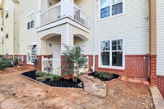 doorway to property with a balcony