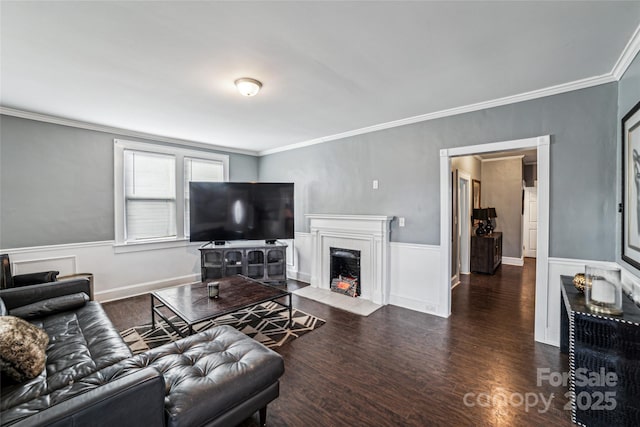 living room featuring crown molding and dark hardwood / wood-style flooring