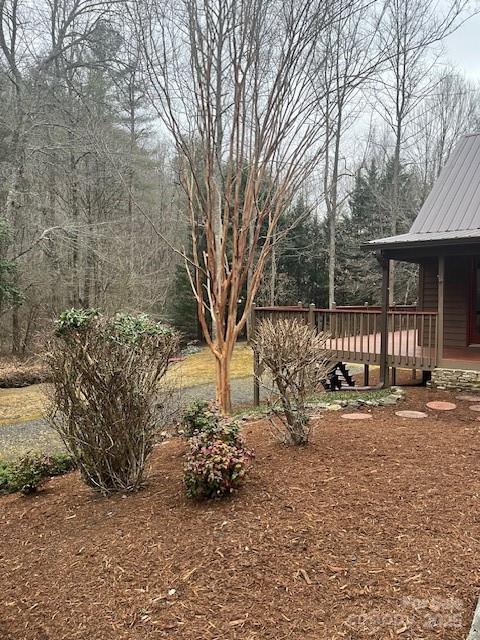 view of yard featuring a deck