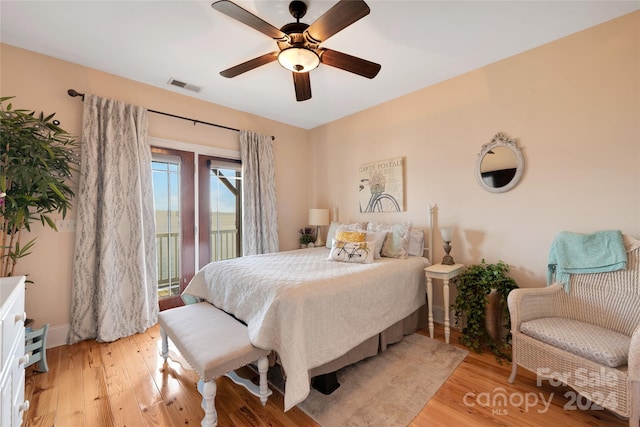 bedroom with ceiling fan and light wood-type flooring