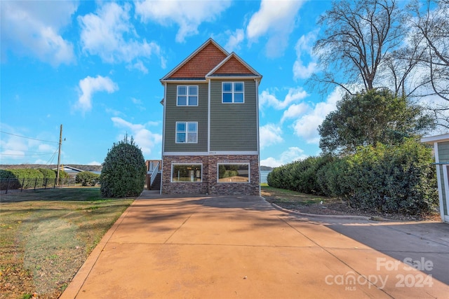 exterior space with a front lawn