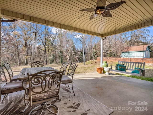 view of patio featuring ceiling fan