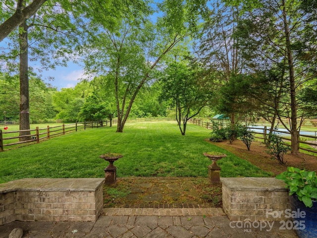 view of yard featuring fence