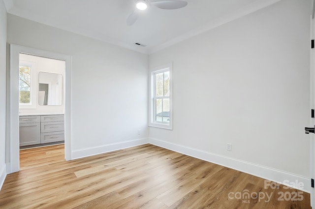 unfurnished bedroom featuring ceiling fan, light hardwood / wood-style floors, and ornamental molding