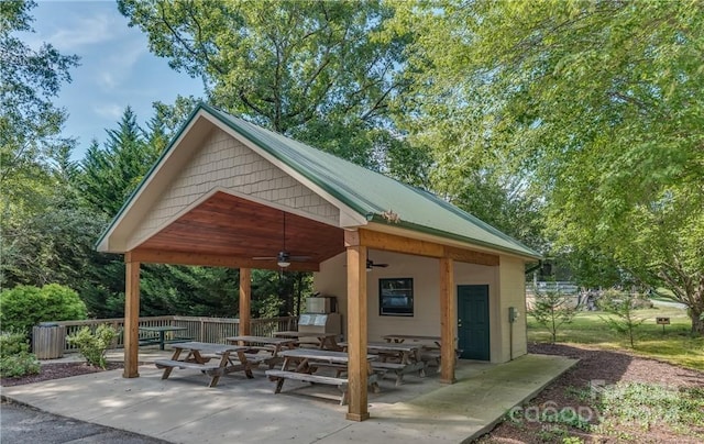 view of property's community with a patio area