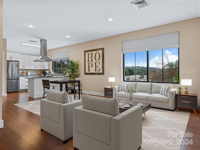 living room with light hardwood / wood-style flooring