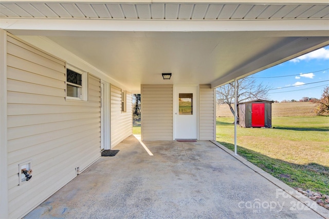 view of patio with a storage shed