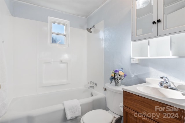 full bathroom featuring bathtub / shower combination, vanity, and toilet