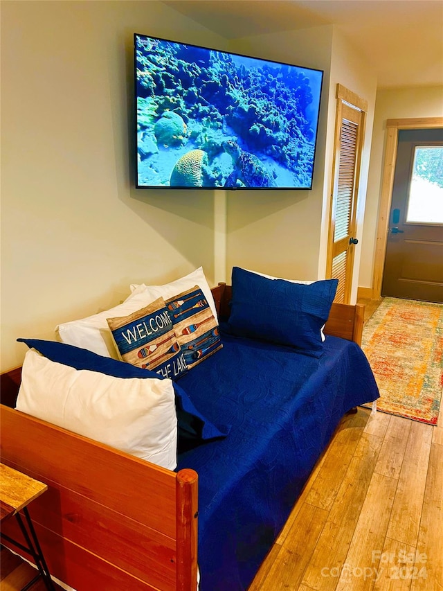 bedroom with light hardwood / wood-style flooring