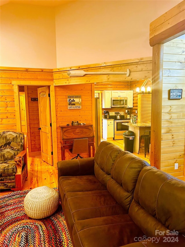 229 Seton Rd, Lake Lure, NC 28746 - living room featuring light wood-type flooring and wood walls