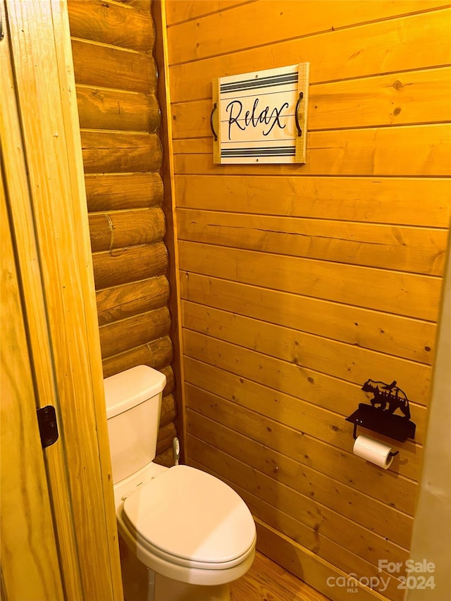 229 Seton Rd, Lake Lure, NC 28746 - bathroom featuring log walls and wood finished floors