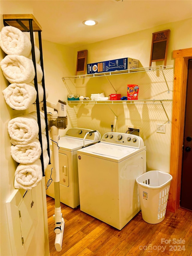 229 Seton Rd, Lake Lure, NC 28746 - washroom featuring separate washer and dryer, wood finished floors, and recessed lighting