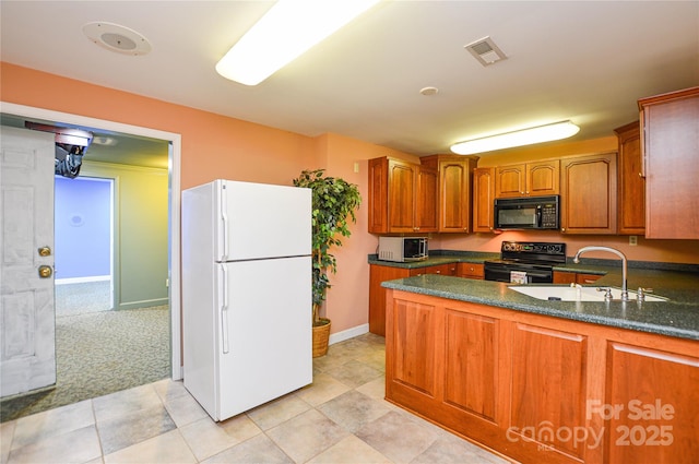 kitchen with sink, light colored carpet, and black appliances