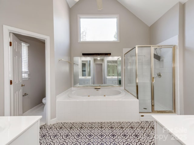 full bathroom featuring plus walk in shower, vanity, toilet, and vaulted ceiling